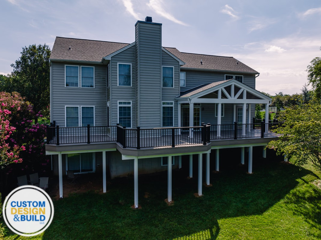 composite-deck-with-a-partial-porch-roof-covering-hardford-county-md_orig covered porch